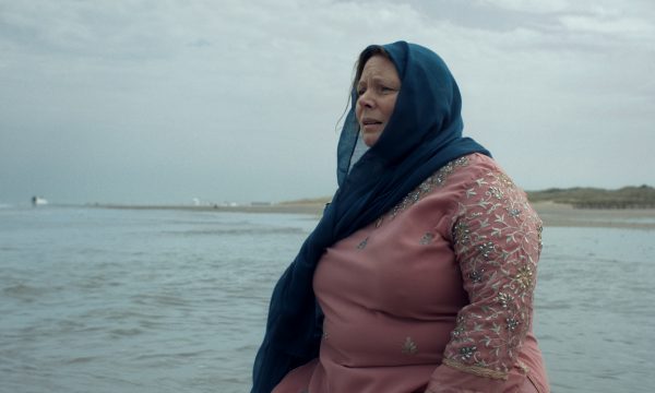 Woman standing on a beach