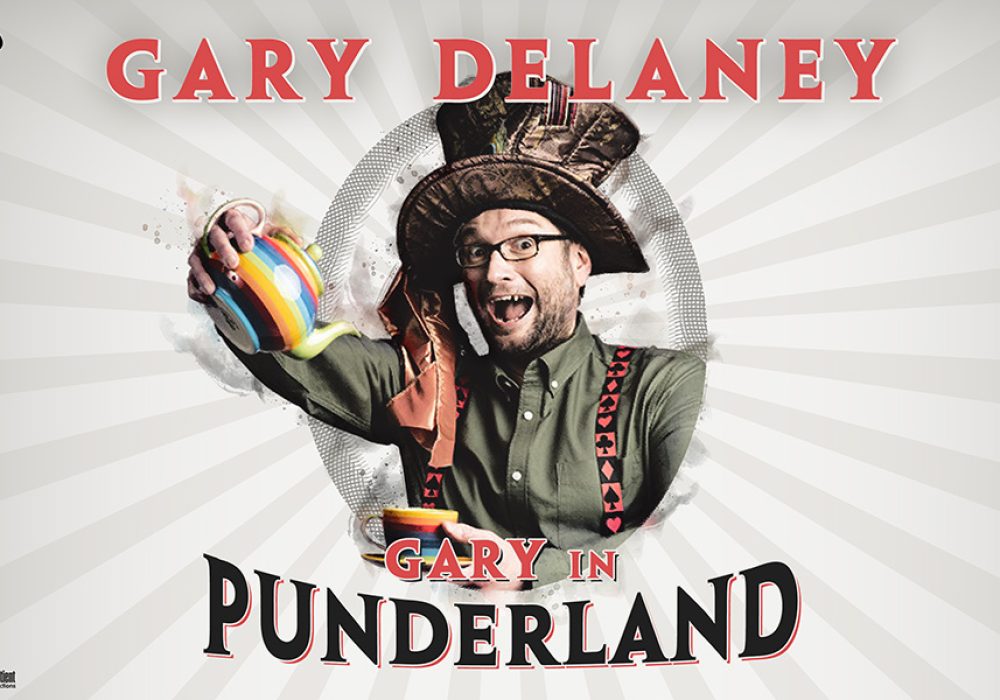 Comedian Gary Delaney in a Mad Hatter style costume looks out into the camera, his mouth is open as if laughing. Above and below him are the words Gary Delaney Punderland.