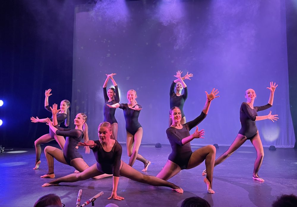 Performers from Stagestruck Dance Academy on stage