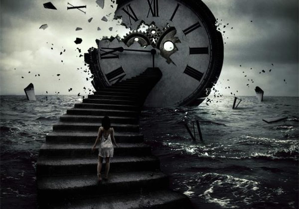 A person walks up stone steps rising out of the sea, towards a large smashed clock at the top