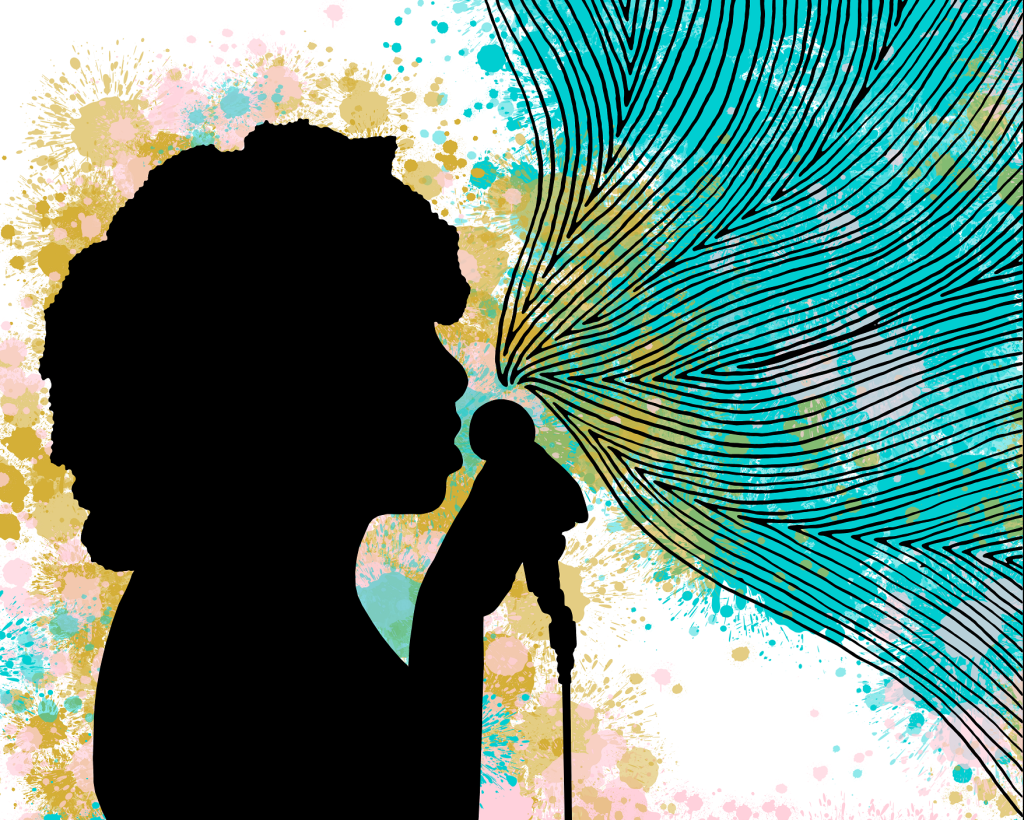 A person stands singing into a microphone with lots of patterns coming out of it.