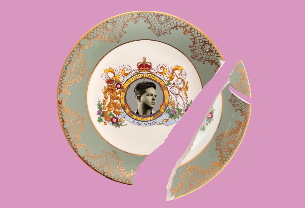 A broken commemorative style china plate, with a picture of Luke in the centre circle, and words around it that read 'To commemorate the Silver Jubilee of Luke Wright. A heraldic lion and unicorn appear either side of this circle.
