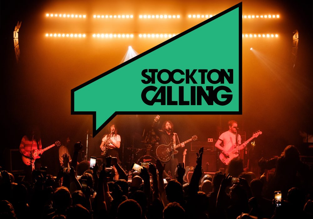 Stockton Calling's logo sits above a 4 piece band playing to a crowd of people