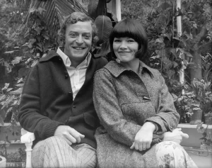 Sir Michael Caine and Glenda Jackson in black and white, 1976