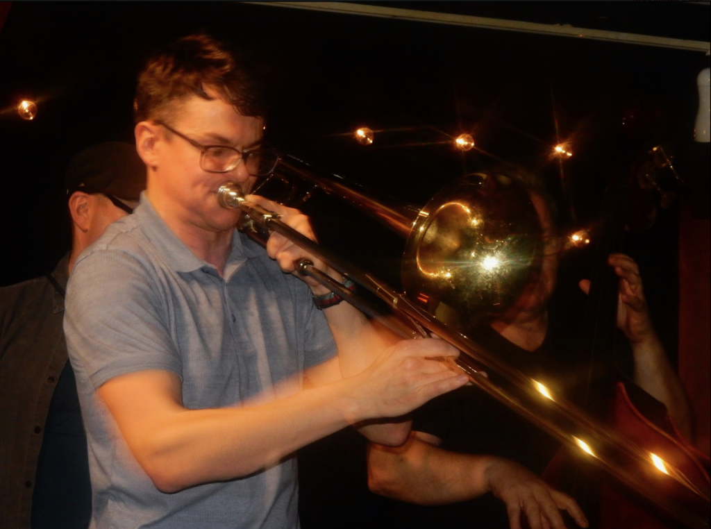trombonist David Gray plays trombone