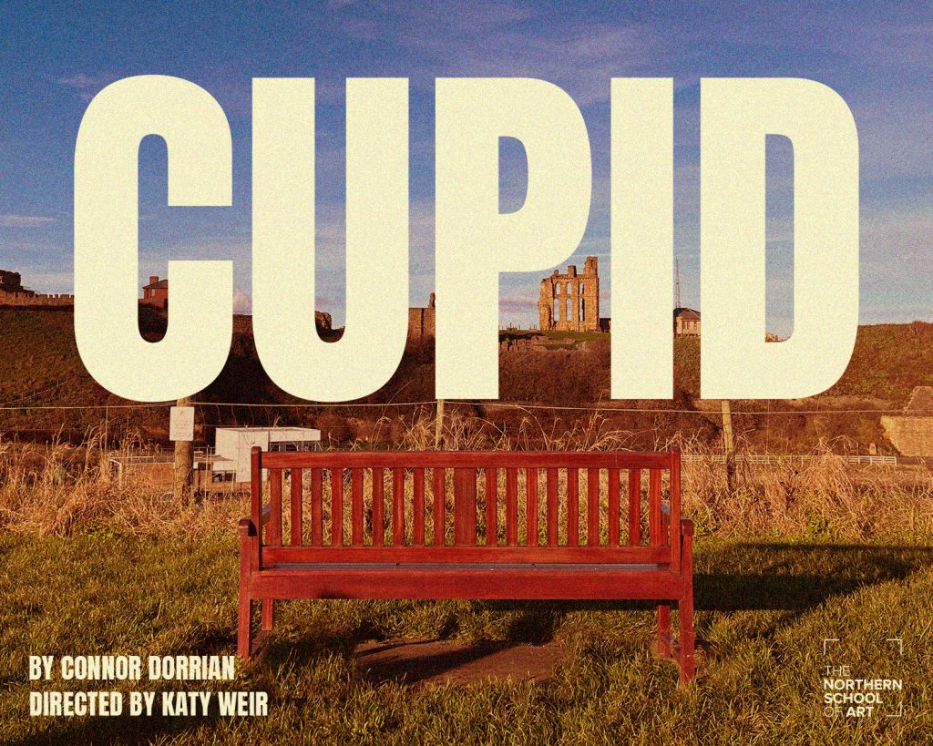 A bench with some historical building ruins in the background. Text reads: CUPID by Connor Dorrian, directed by Katy Weir