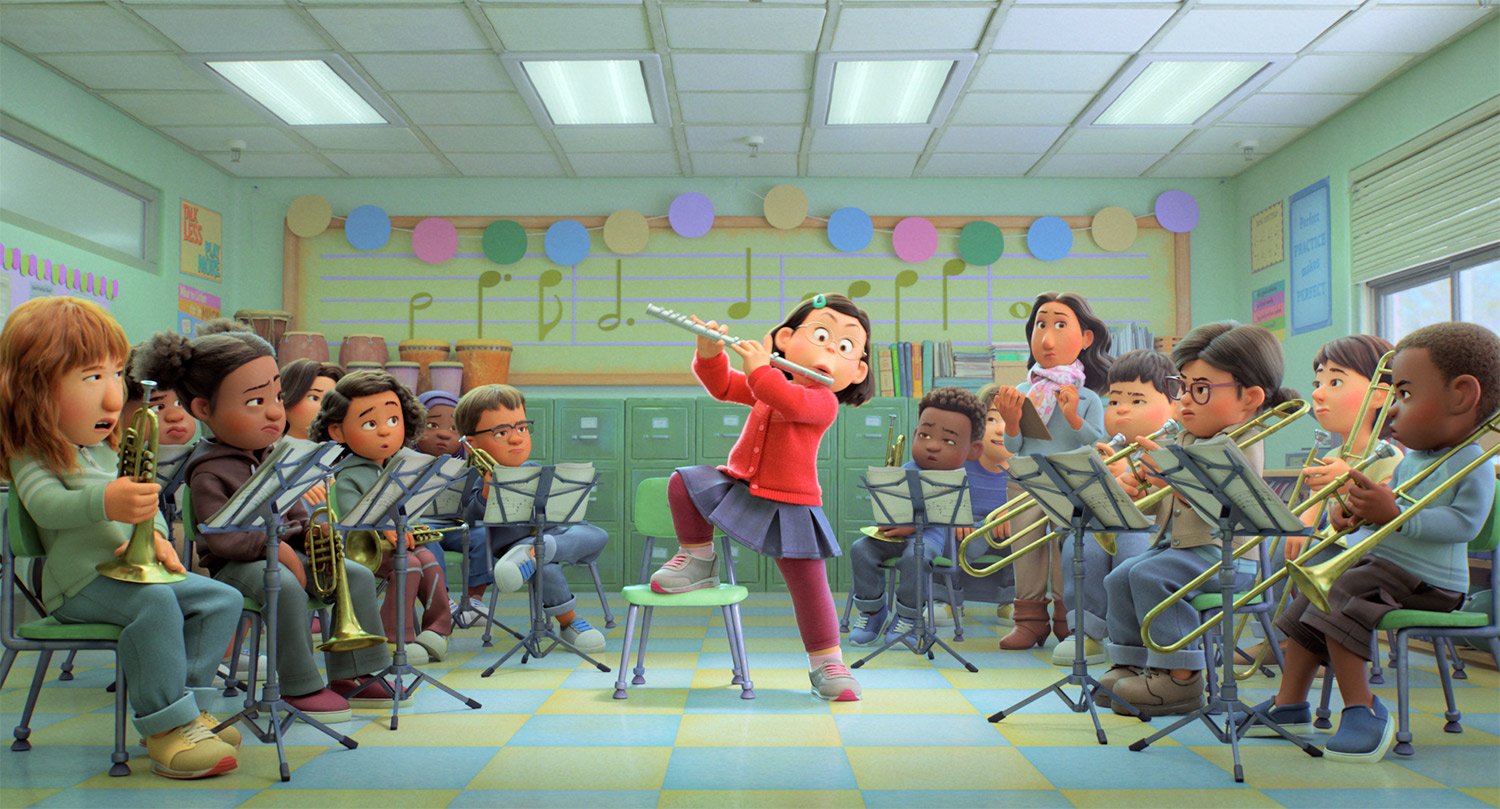 A room full of children taking part in an orchestra