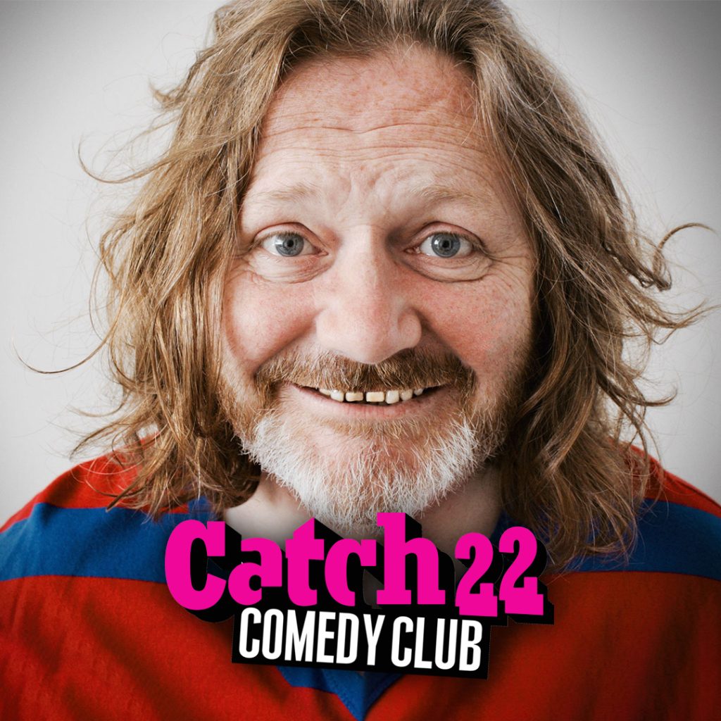 John grins at you featuring Catch 22 Comedy Club logo