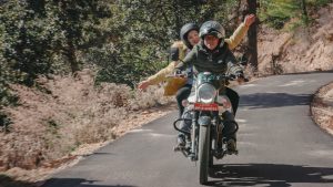 Amber and Sarita on a motorbike.