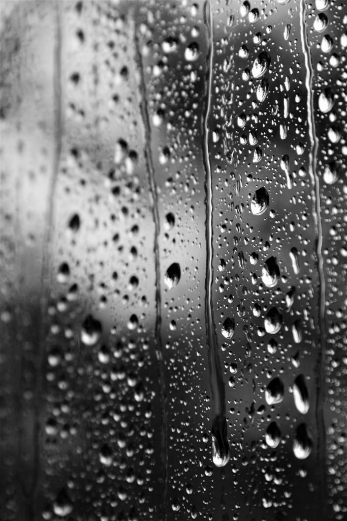 Raindrops on a pane of glass.