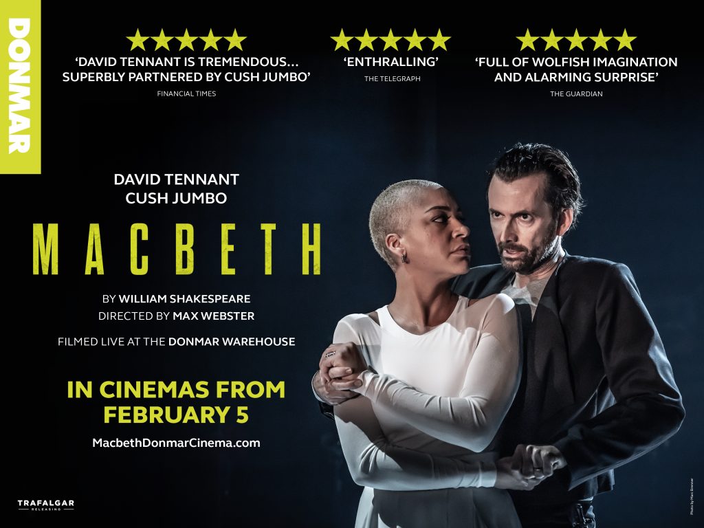 Cinema poster for MACBETH. Text is in wite and lime green. Cush Jumbo a mixed race woman with short blonde hair wearing a white top has her arms crossed over her body holding David Tennant a white male with gelled back dark hair wearing a dark suit jacket and grey t-shirt.